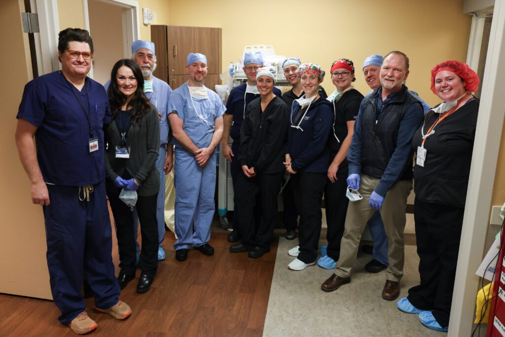 Surgical team performing LITT procedure