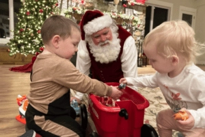 Sensory Santa plays with brother and sister_2023