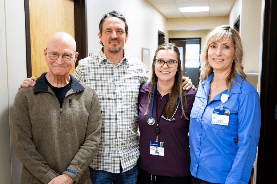 Dr. Brunson and team with Robert Griffin