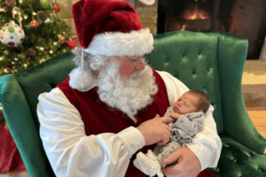 Sensory Santa holds infant_2023