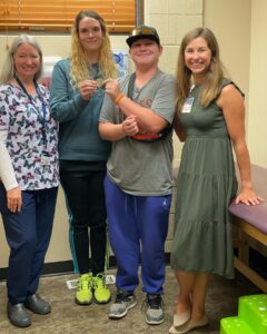 Katie Flass with a patient family